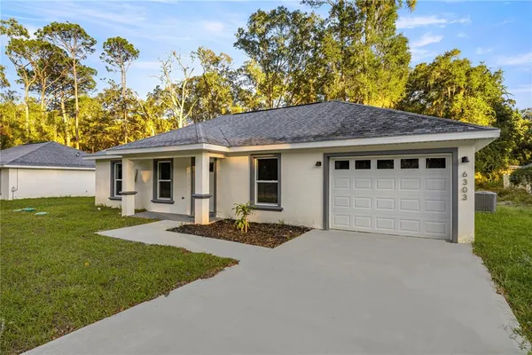 a house view with a garden space