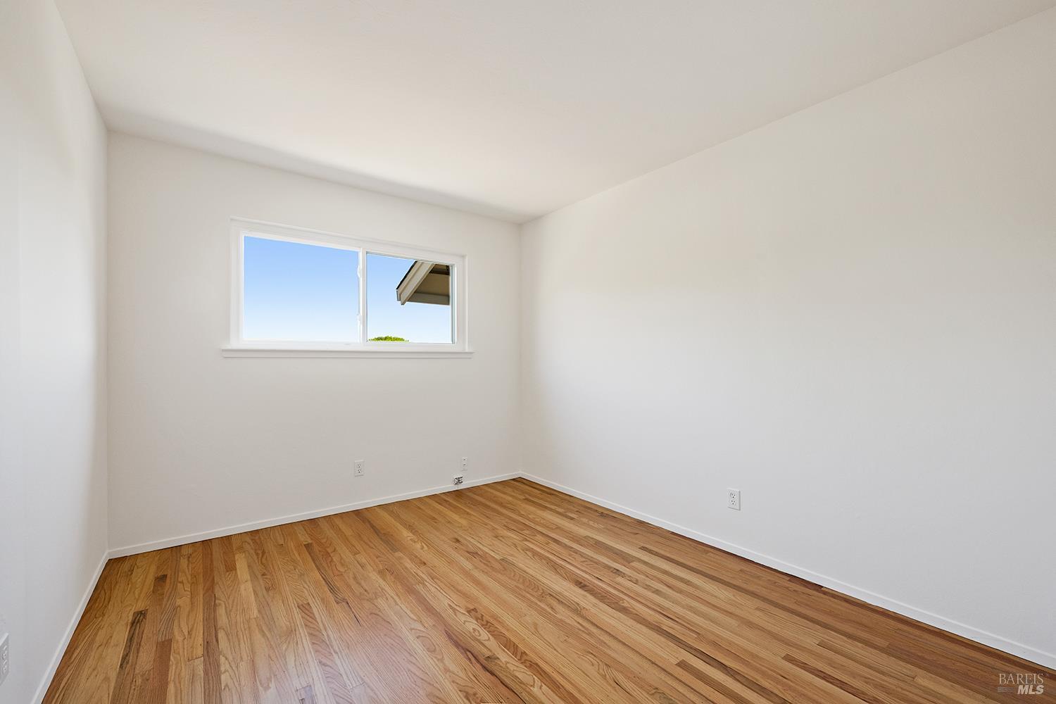 35 Salvador Way San Rafael, CA 94903 - Photo 20 of 46 a view of a room with wooden floor and white walls