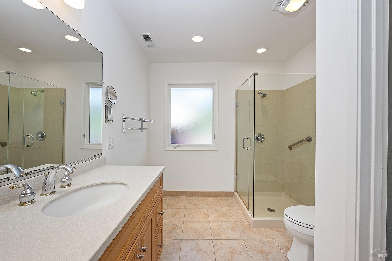 35 Salvador Way San Rafael, CA 94903 - Photo 26 of 46 a bathroom with a sink toilet and shower