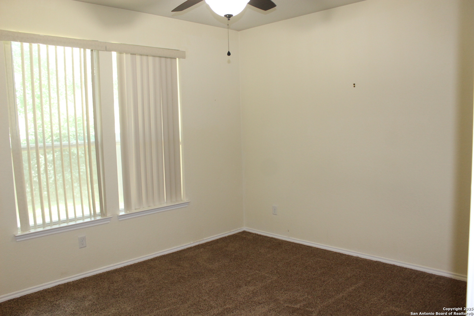 482 Walnut Crest Selma, TX 78154 - Photo 13 of 19 an empty room with a window