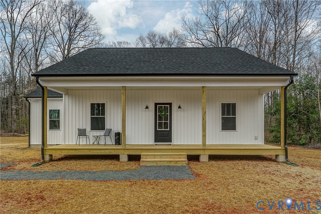 1343 Stokes Station Road Goochland, VA 23063 - Photo 1 of 35 a front view of a house with garden
