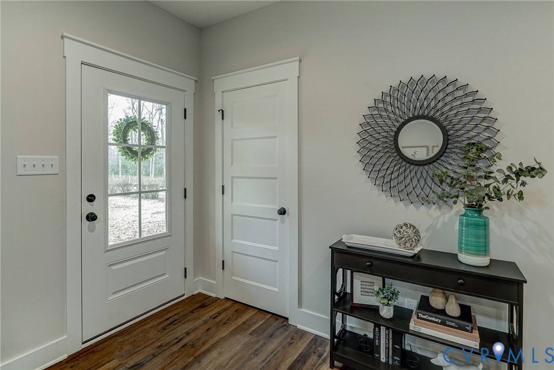 1343 Stokes Station Road Goochland, VA 23063 - Photo 13 of 35 a view of a room with furniture and wooden floor