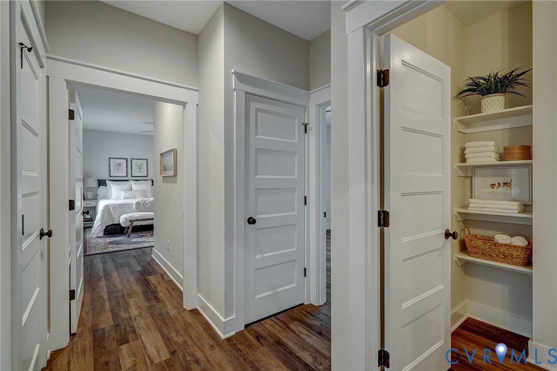 1343 Stokes Station Road Goochland, VA 23063 - Photo 20 of 35 a view of a hallway and a livingroom with furniture
