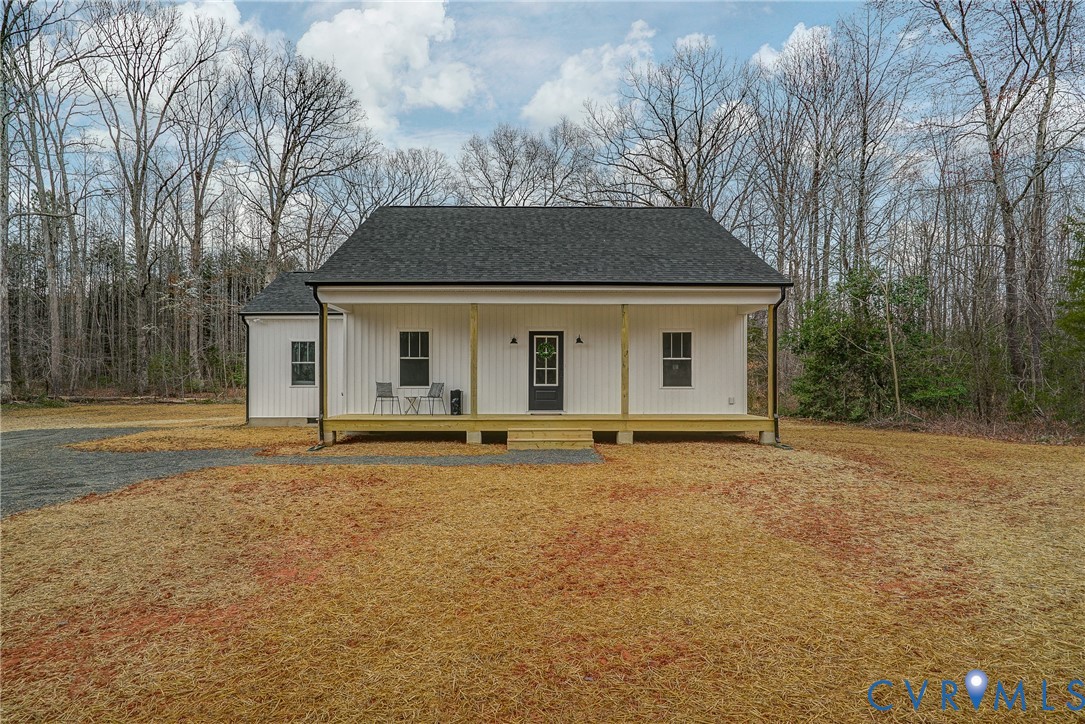 1343 Stokes Station Road Goochland, VA 23063 - Photo 2 of 35 front view of a house with a garden