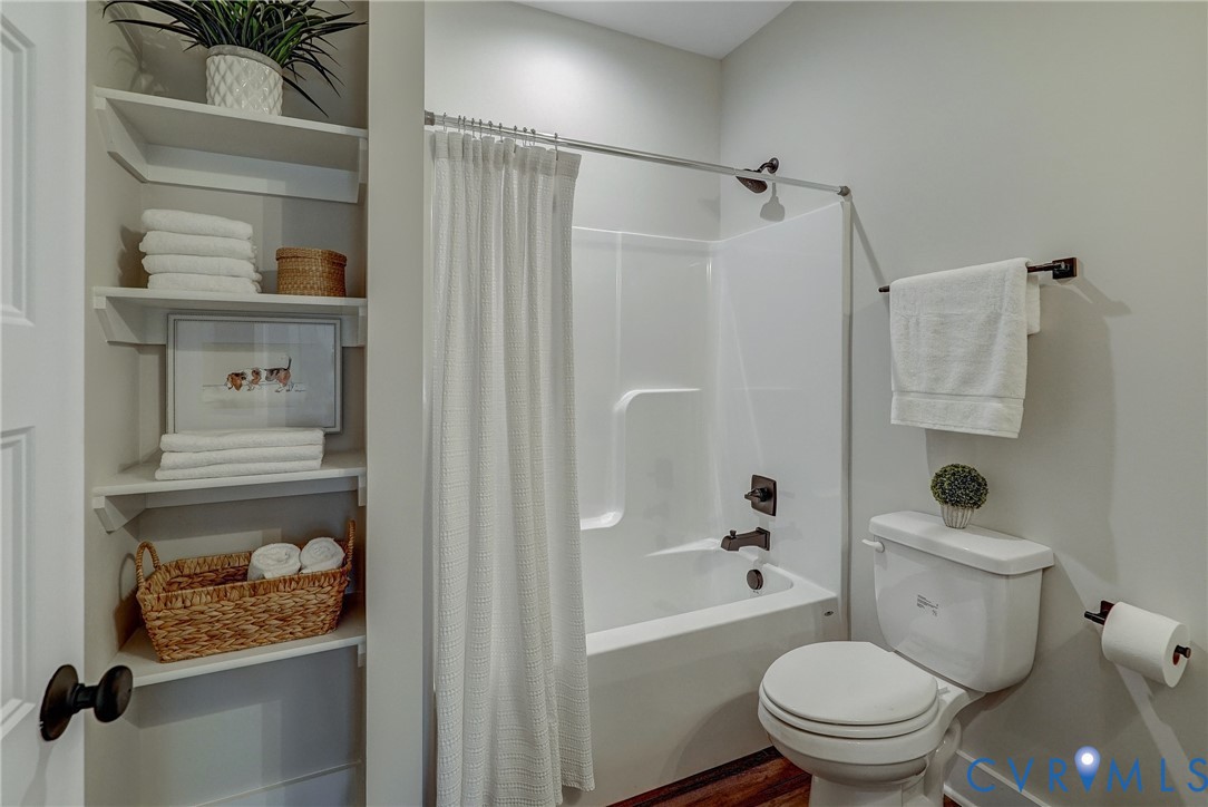 1343 Stokes Station Road Goochland, VA 23063 - Photo 21 of 35 a bathroom with a toilet and a shower