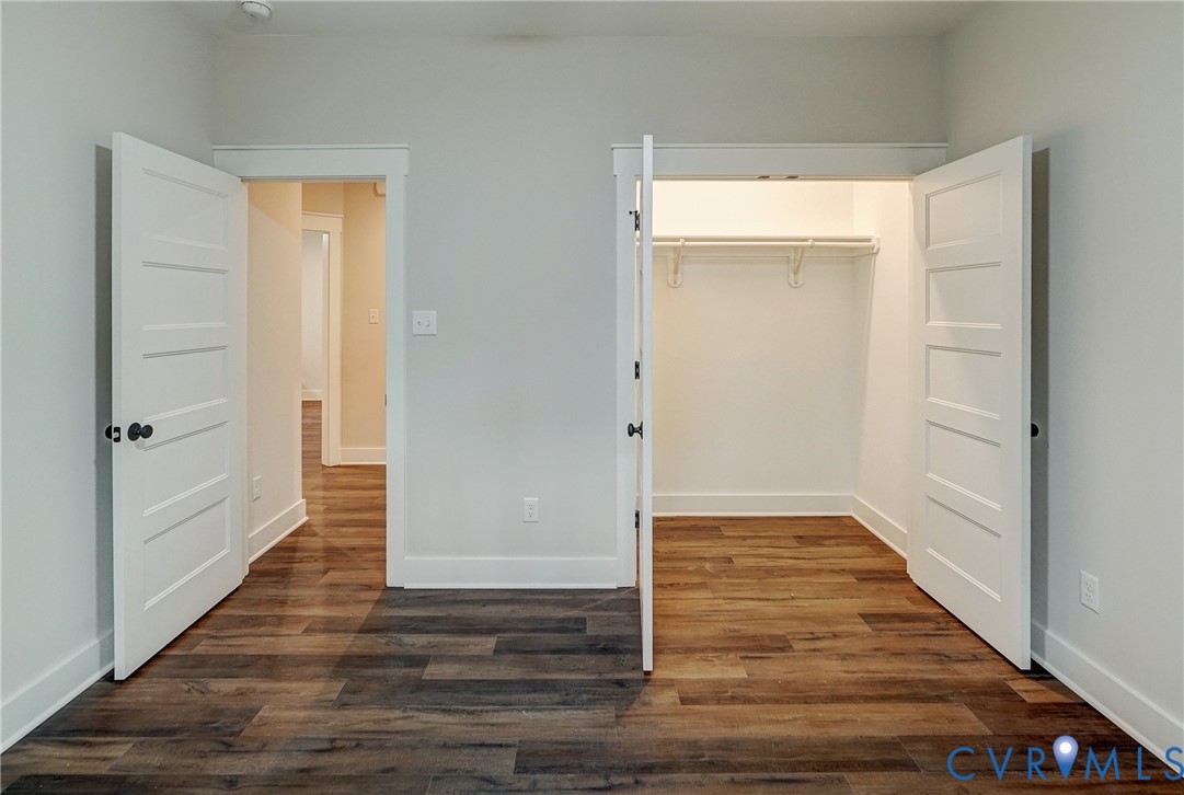 1343 Stokes Station Road Goochland, VA 23063 - Photo 26 of 35 a view of a hallway with wooden floor