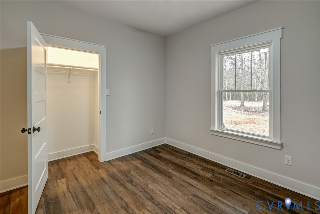 1343 Stokes Station Road Goochland, VA 23063 - Photo 28 of 35 a view of a room with wooden floor and window