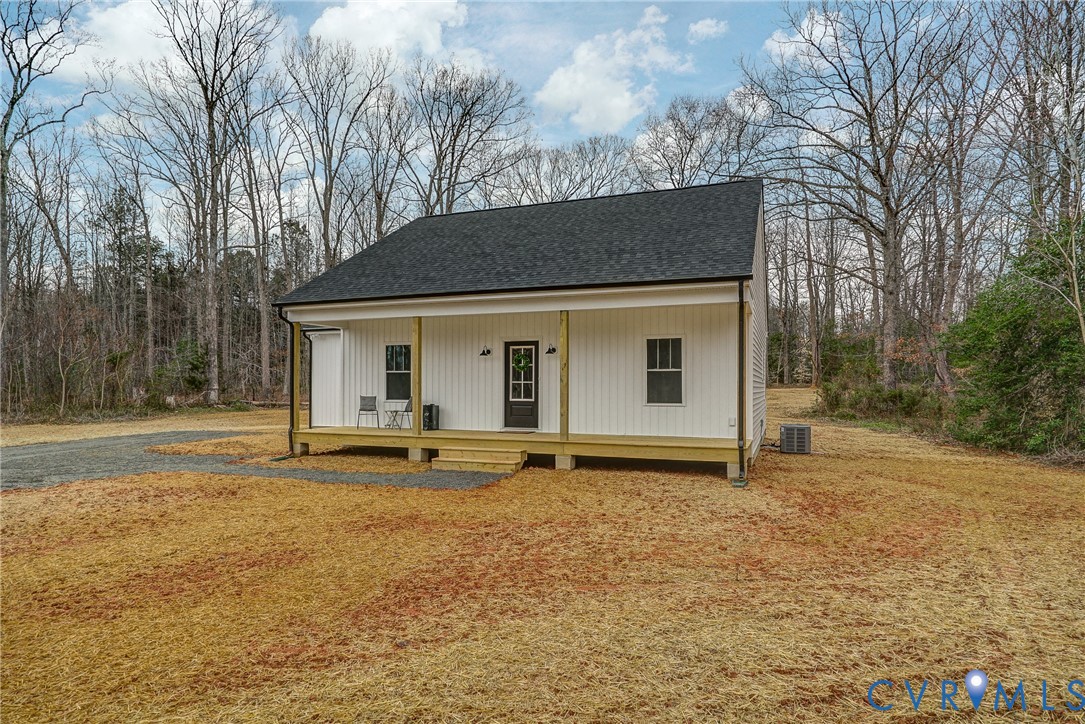 1343 Stokes Station Road Goochland, VA 23063 - Photo 4 of 35 front view of a house with a yard
