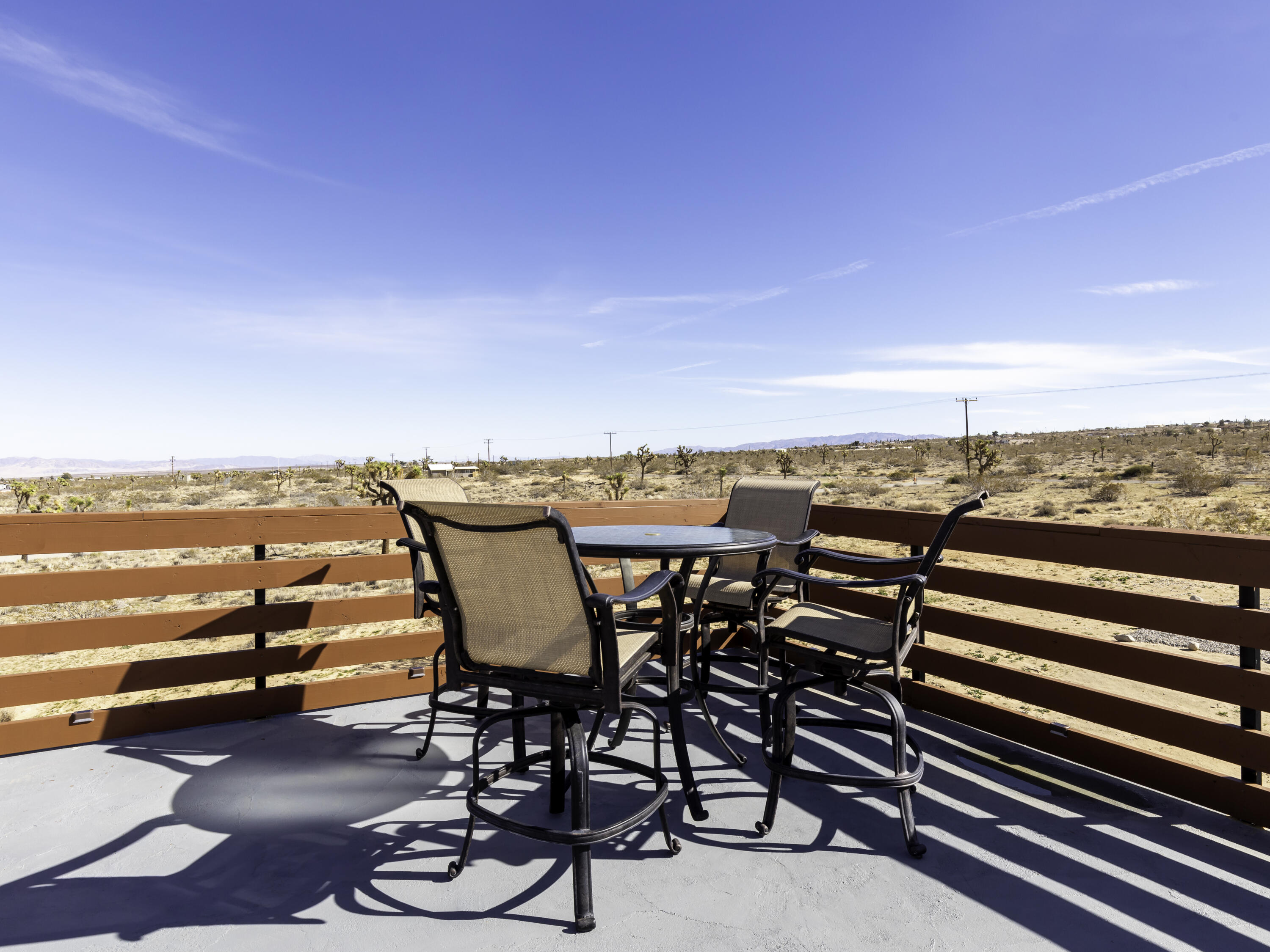 59130 Reche Road Landers, CA 92285 - Photo 55 of 69 a view of a terrace with furniture and city view