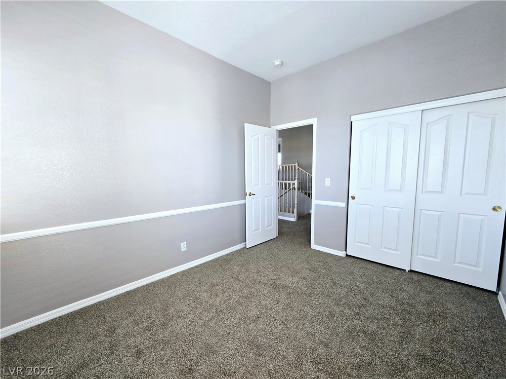 3759 Funston Way Las Vegas, NV 89129 - Photo 29 of 31 A versatile room awaits personalization, complete with abundant closet space and plush carpeting.