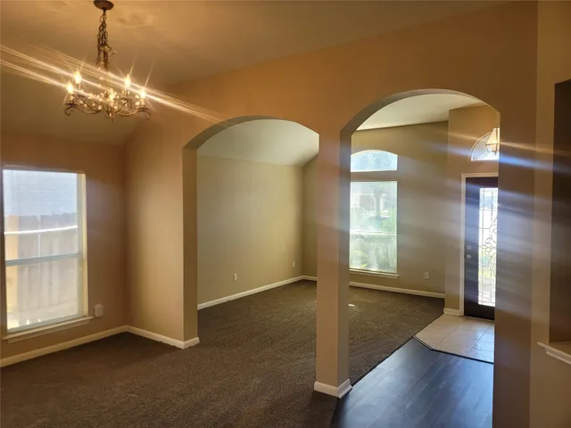 a view of a livingroom with a chandelier