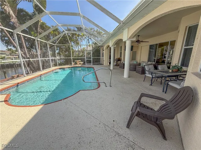 a view of a patio in backyard