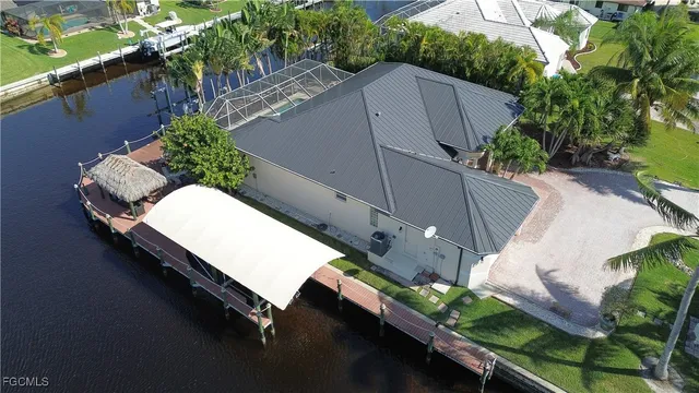 a view of a backyard with sitting area