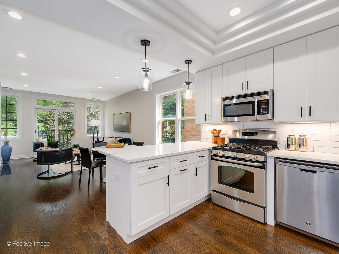 1404 North Mohawk Street, Unit 2 Chicago, IL 60610 - Photo 2 of 14 a kitchen with stove a sink and refrigerator