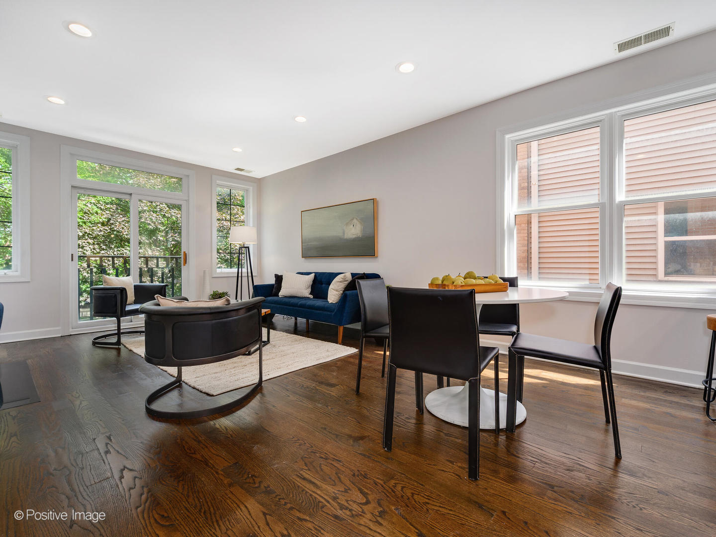 1404 North Mohawk Street, Unit 2 Chicago, IL 60610 - Photo 3 of 14 a living room with furniture and a wooden floor