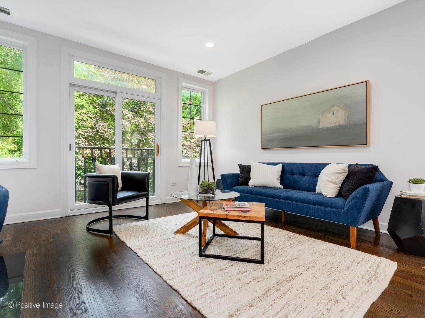 1404 North Mohawk Street, Unit 2 Chicago, IL 60610 - Photo 4 of 14 a living room with furniture and a wooden floor
