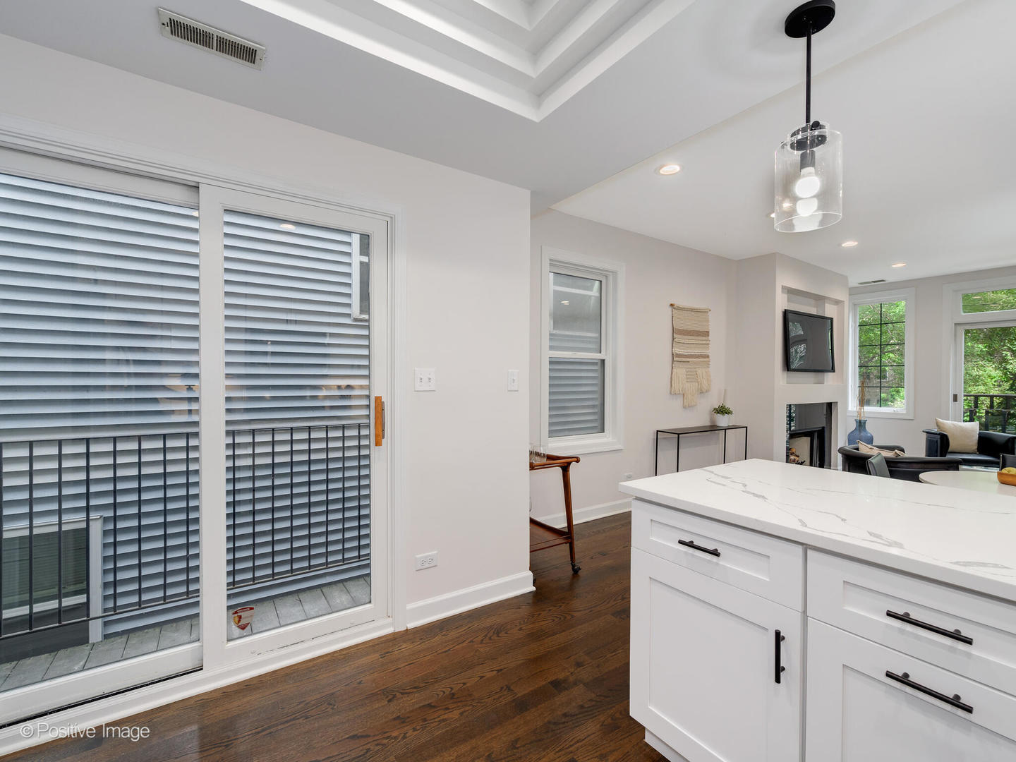 1404 North Mohawk Street, Unit 2 Chicago, IL 60610 - Photo 7 of 14 a view of a center island and wooden floor