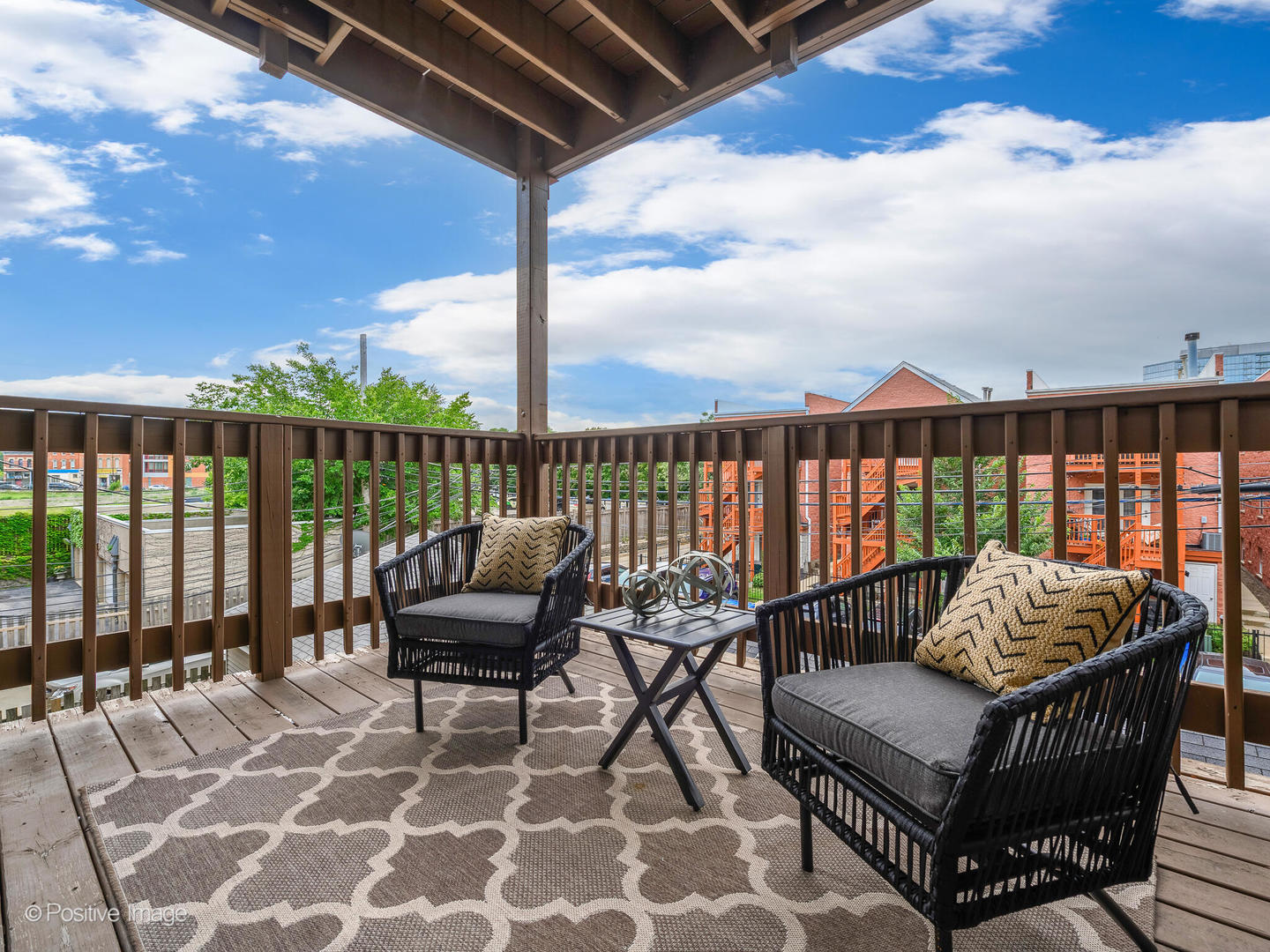 1404 North Mohawk Street, Unit 2 Chicago, IL 60610 - Photo 8 of 14 a balcony with furniture