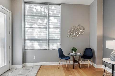 a workspace with furniture and window