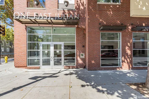 a view of a building with a street