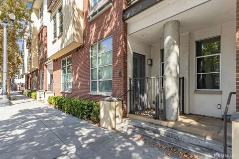 a open kitchen with stainless steel appliances granite countertop a sink and cabinets
