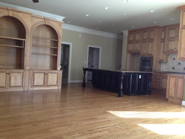 409 Sandcastle Road Franklin, TN 37069 - Photo 5 of 12 Incredible Family Room with builit in bookcase and stone fireplace.
