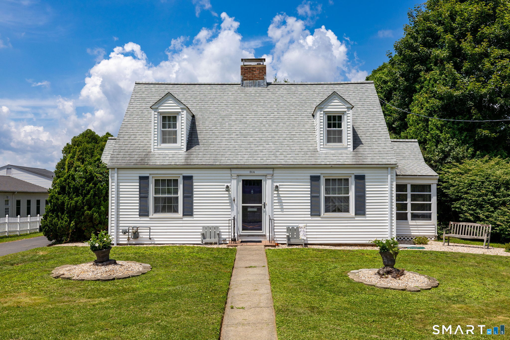 564 Main Street Portland, CT 06480 - Photo 3 of 40 Set Back aways from the street, and quietly situated with plenty of parking in addition to your oversized garage.