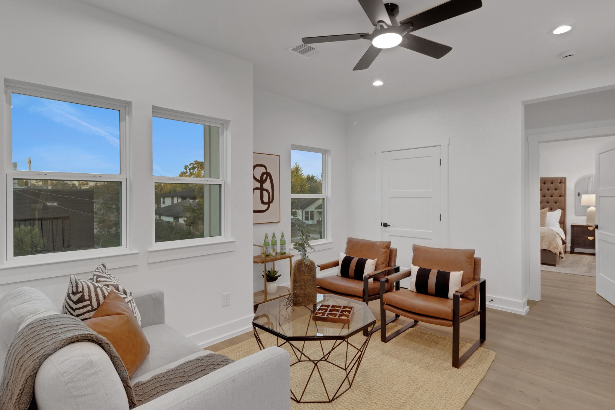 4202 Plaag Street Houston, TX 77016 - Photo 20 of 38 Versatile upstairs game room with abundant natural light—ideal for a second living area or playroom.