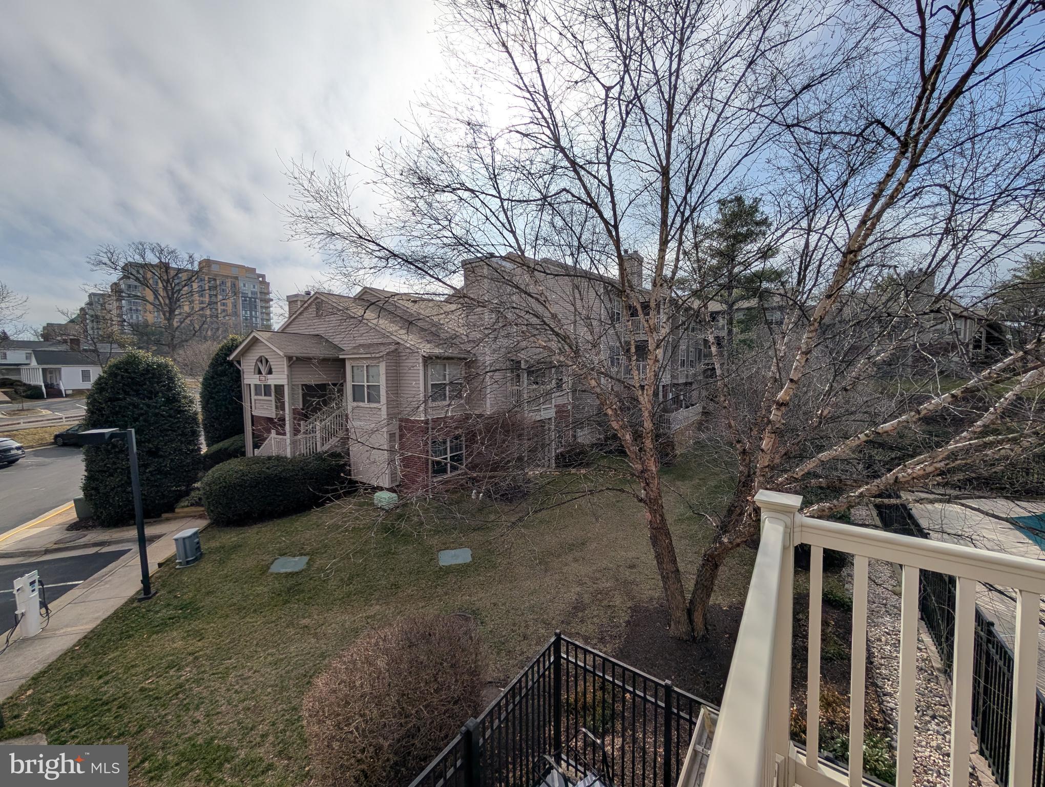 1708 Abercromby Court, Unit 1708B Reston, VA 20190 - Photo 21 of 26 a view of a house with a yard
