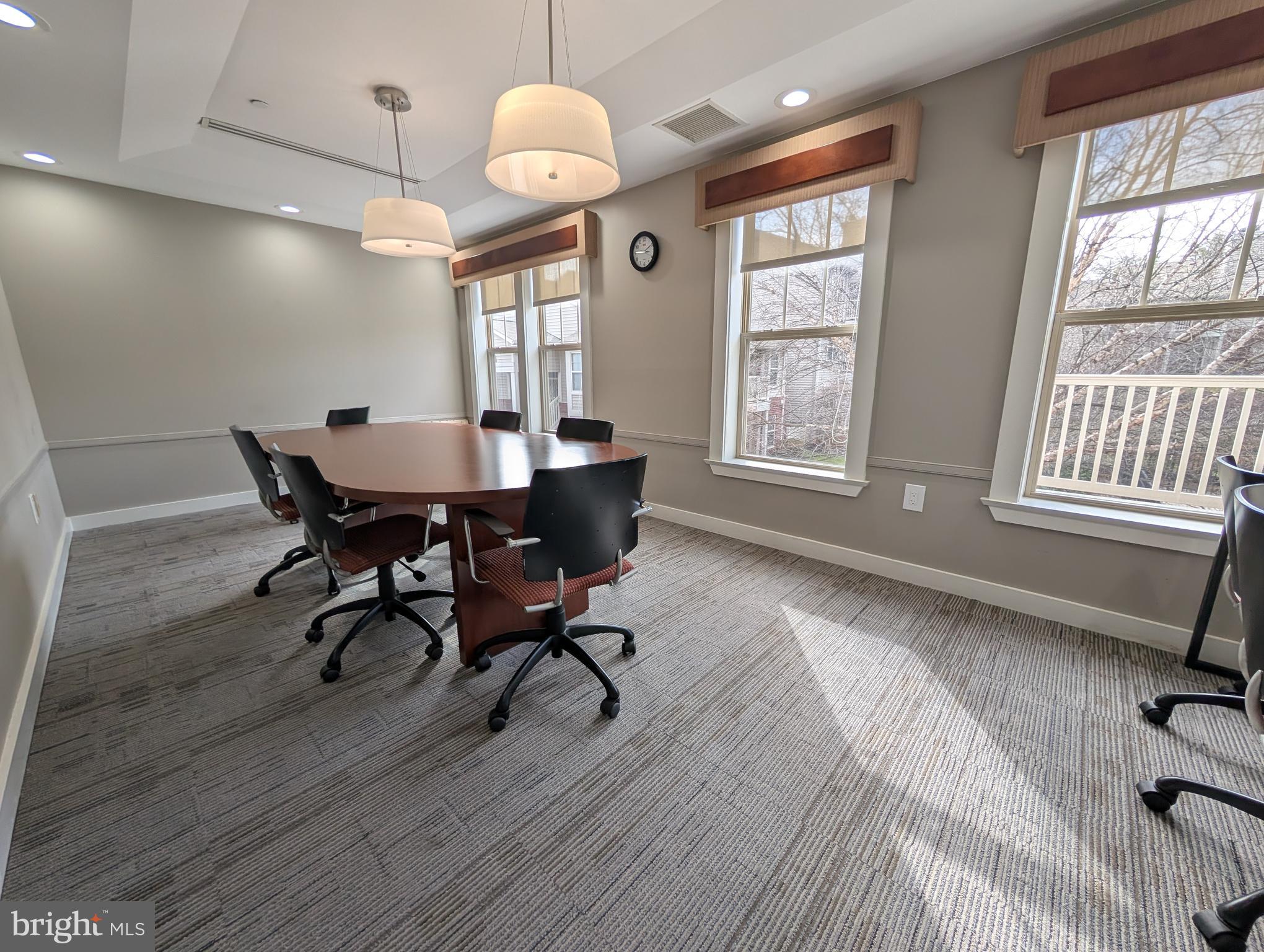 1708 Abercromby Court, Unit 1708B Reston, VA 20190 - Photo 24 of 26 a view of a a dining room with furniture window and wooden floor