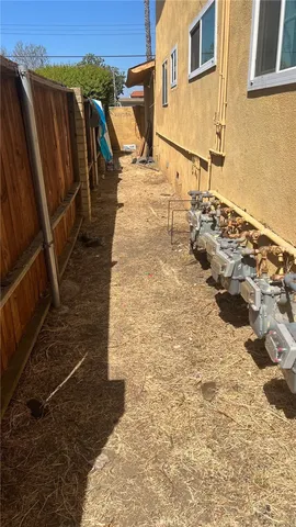 a view of a backyard of the house