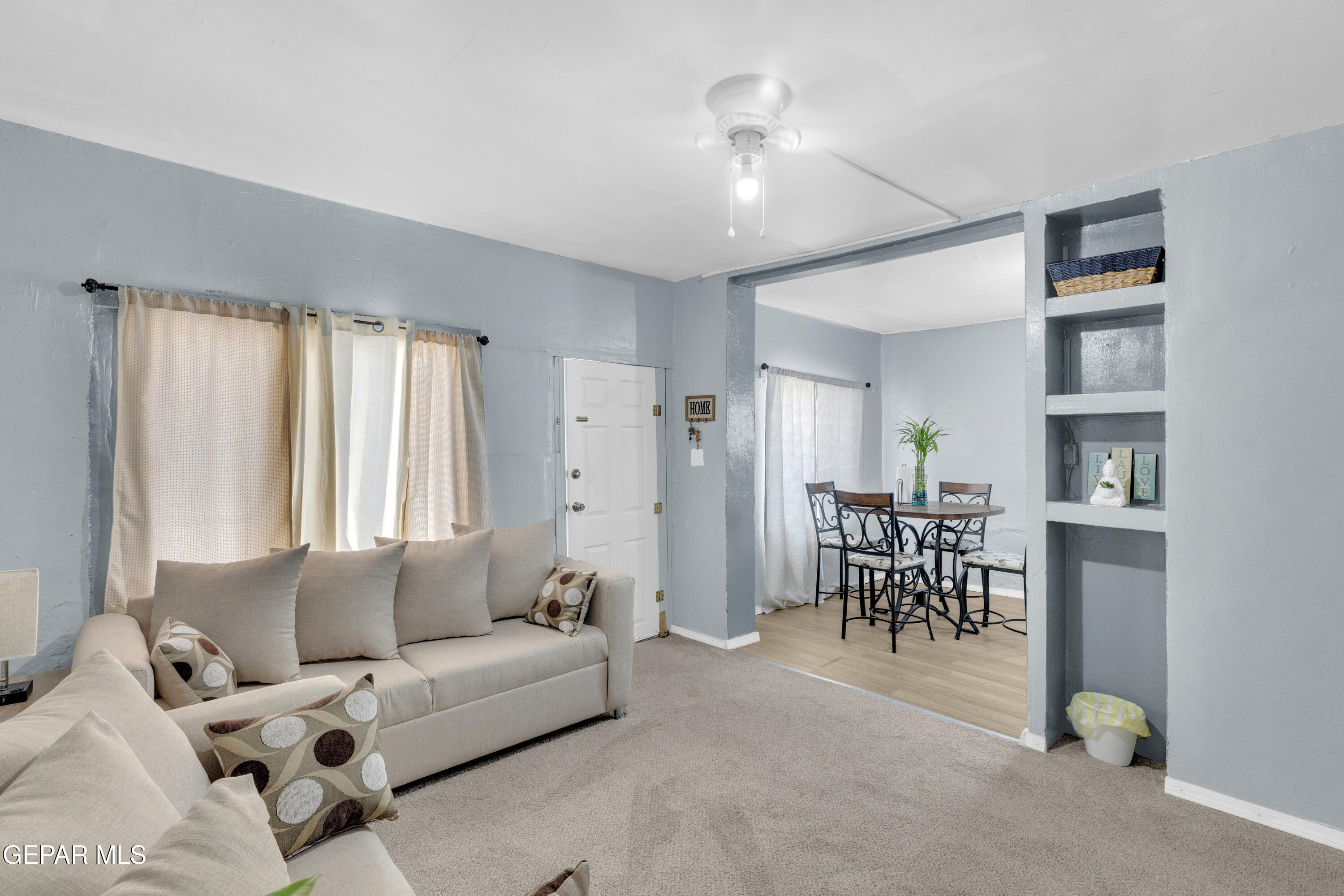 720 Johnson Street Fabens, TX 79838 - Photo 11 of 68 a living room with furniture and a window