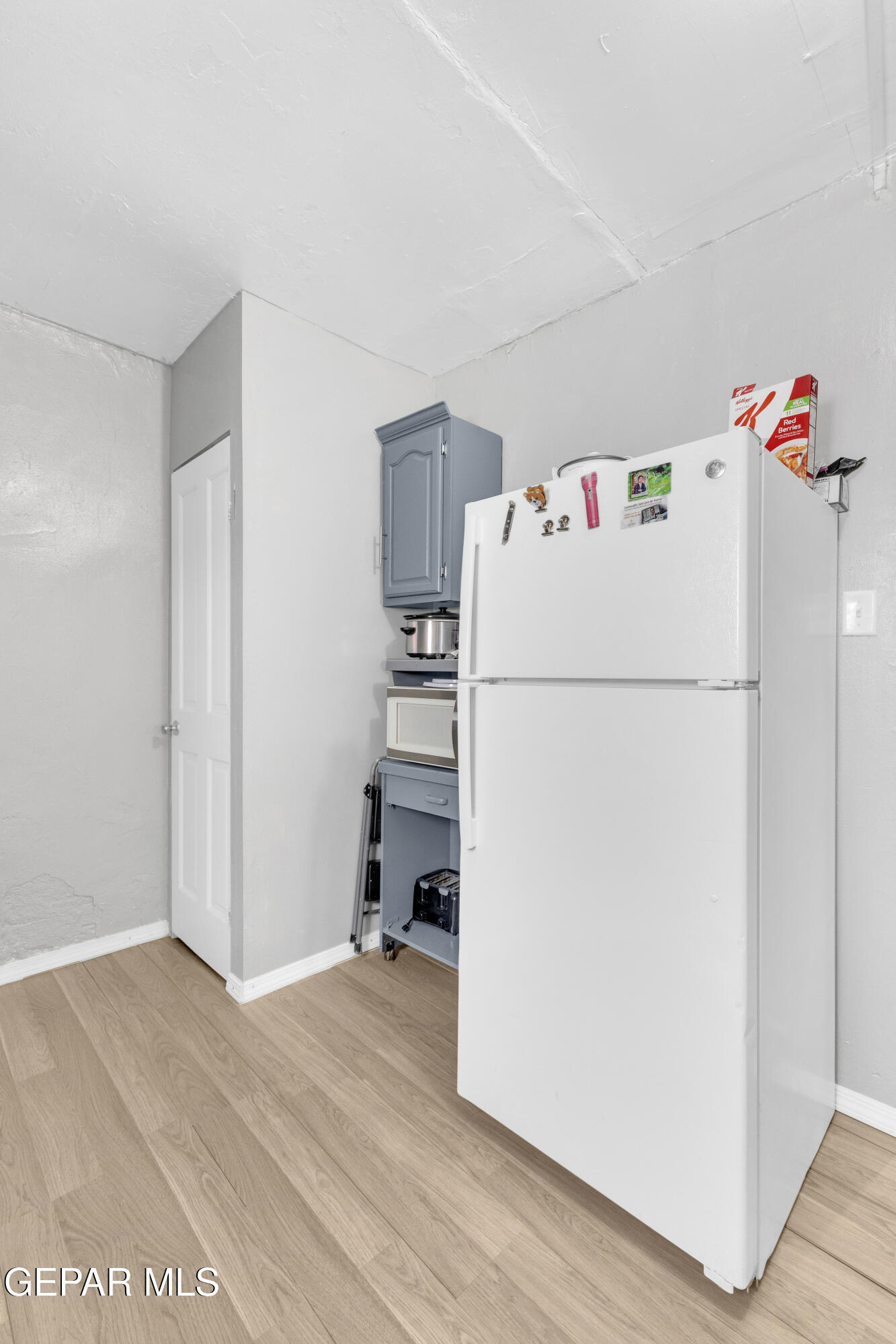 720 Johnson Street Fabens, TX 79838 - Photo 17 of 68 a white refrigerator freezer sitting in a kitchen