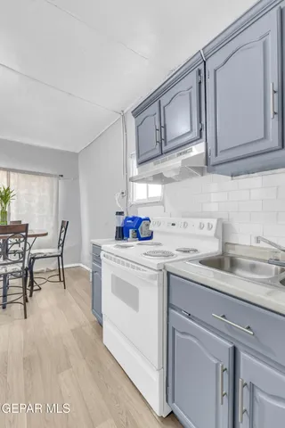 a view of a house with a street