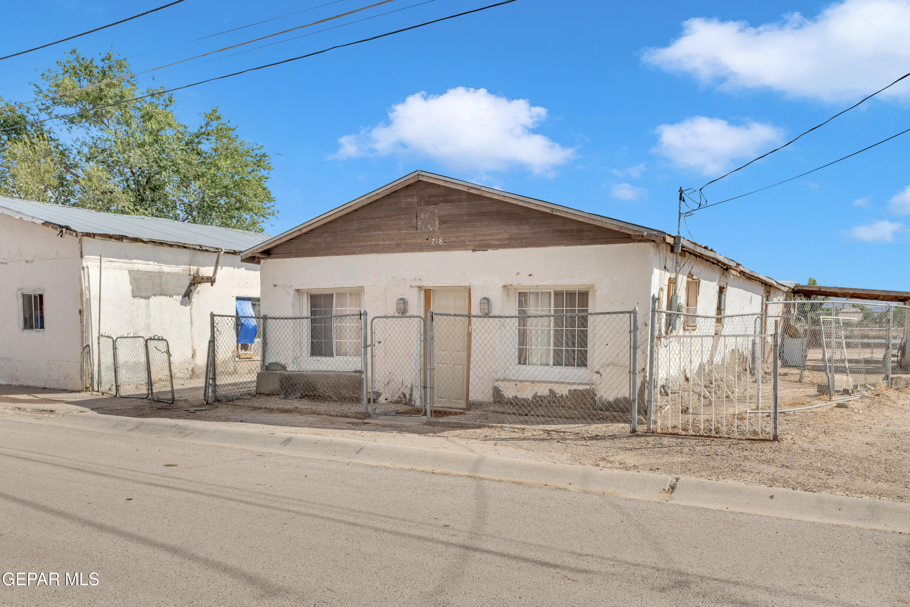 720 Johnson Street Fabens, TX 79838 - Photo 2 of 68 a front view of a house