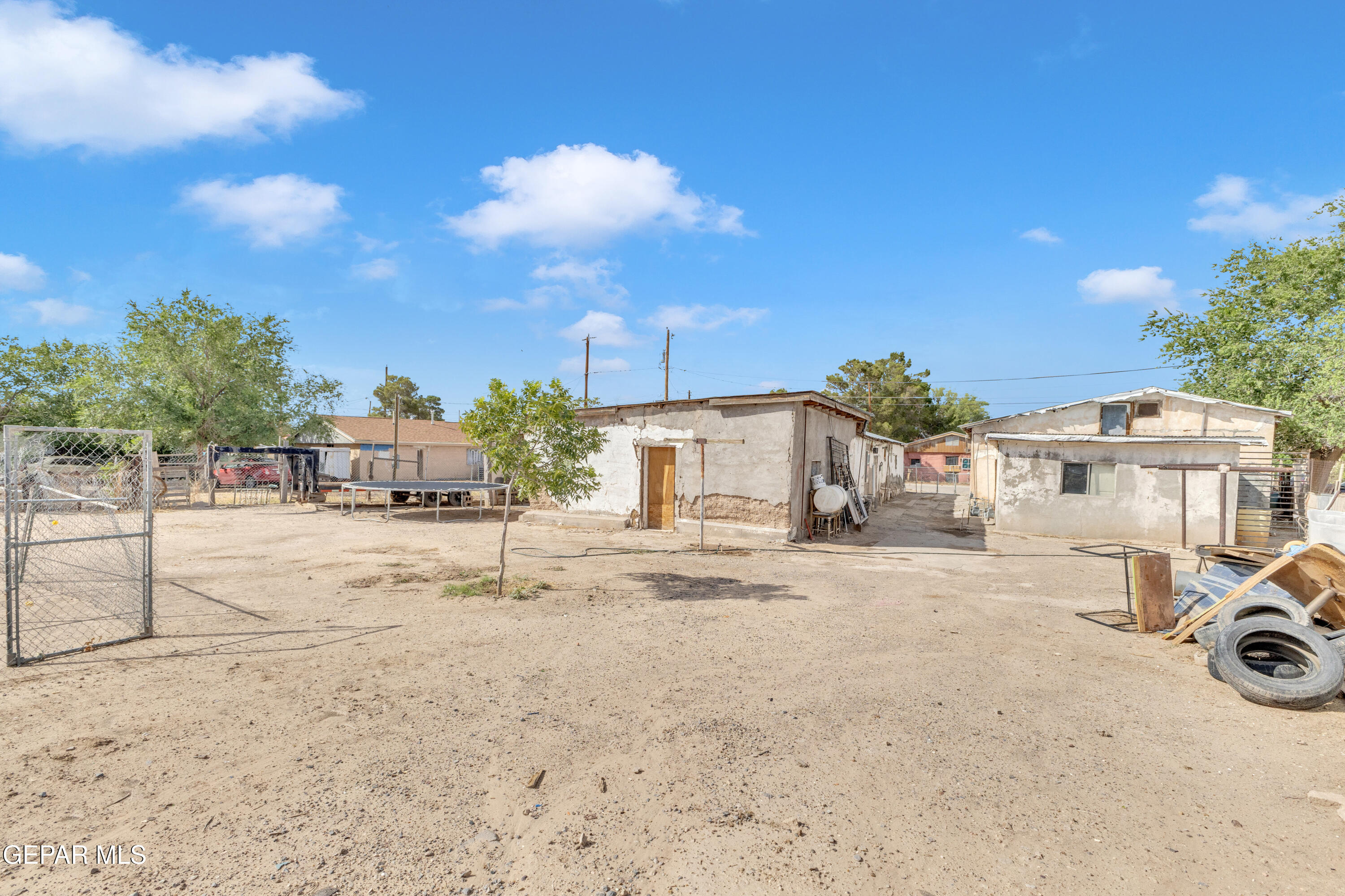 720 Johnson Street Fabens, TX 79838 - Photo 22 of 68 a view of a sink and cars parked in front of a house
