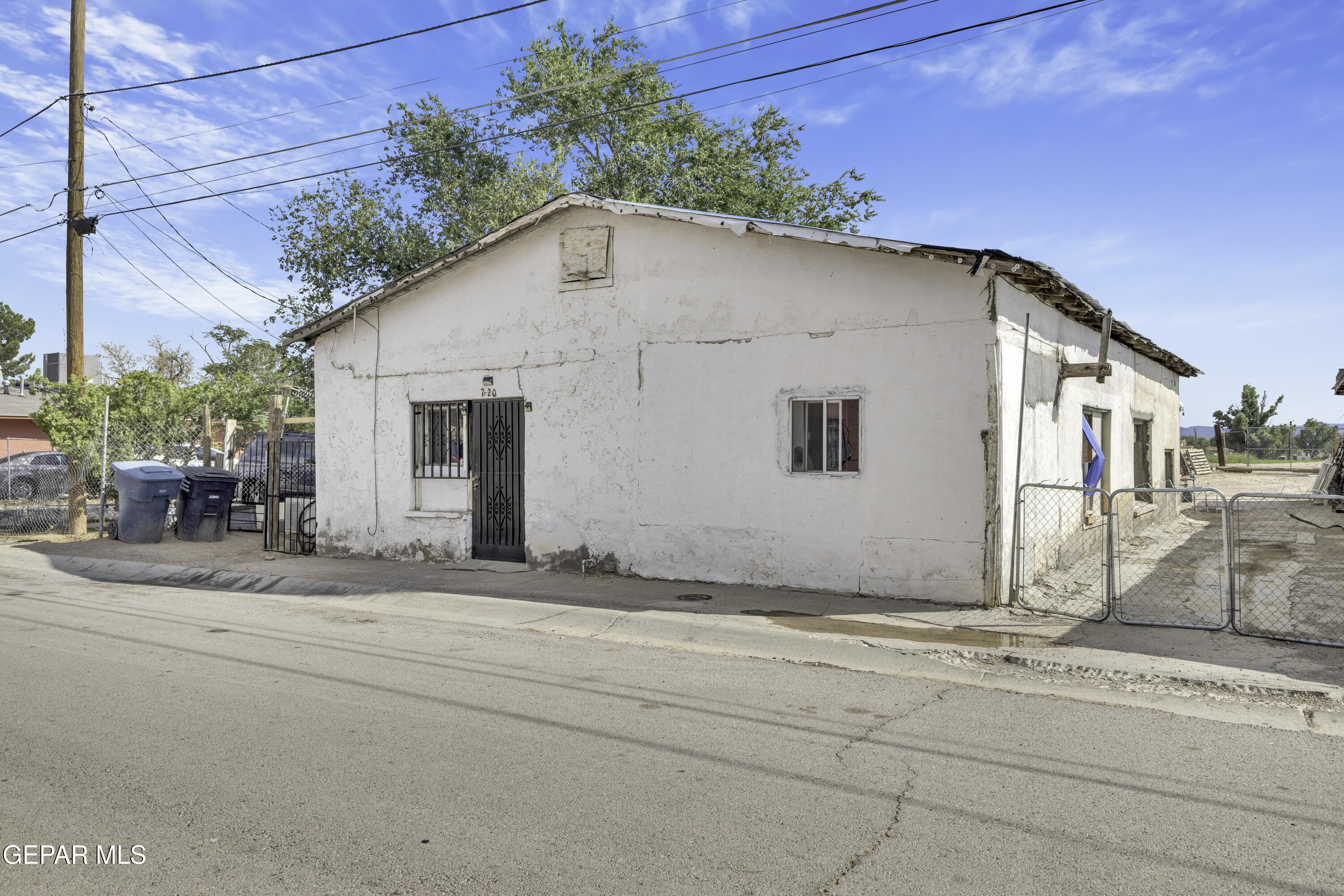 720 Johnson Street Fabens, TX 79838 - Photo 25 of 68 a white house with tree in front of it