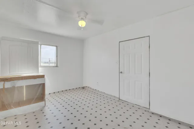 a bedroom with a bed and a bathroom