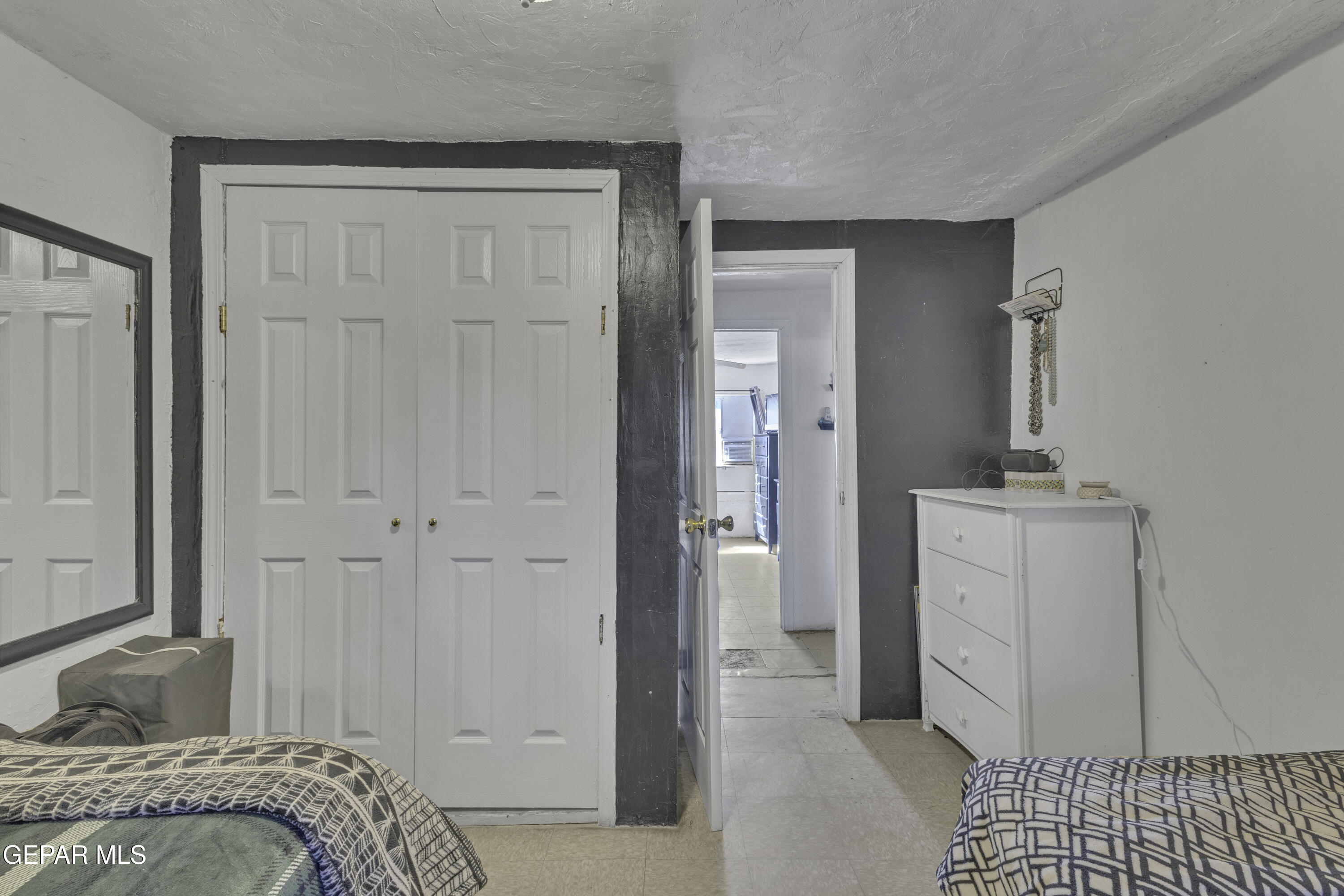 720 Johnson Street Fabens, TX 79838 - Photo 46 of 68 a bedroom with a bed and a sink