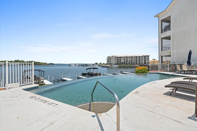 $329,500 | 168 Lake Point Boulevard, Unit C202, Conroe, TX 77356