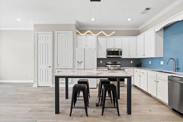 $329,500 | 168 Lake Point Boulevard, Unit C202, Conroe, TX 77356