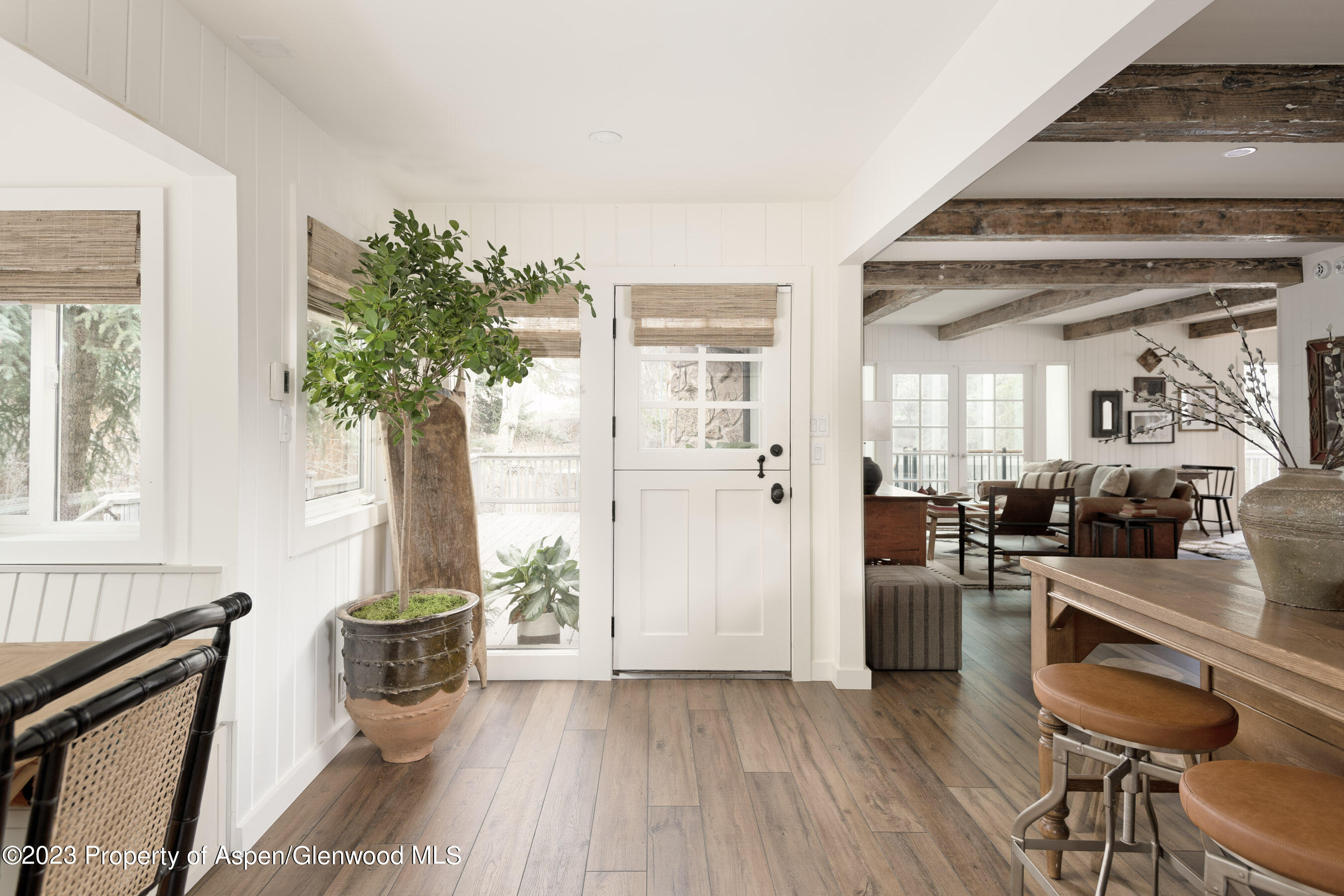 1470 Snowmass Creek Road Snowmass, CO 81654 - Photo 18 of 63 a view of a kitchen with furniture and a potted plant