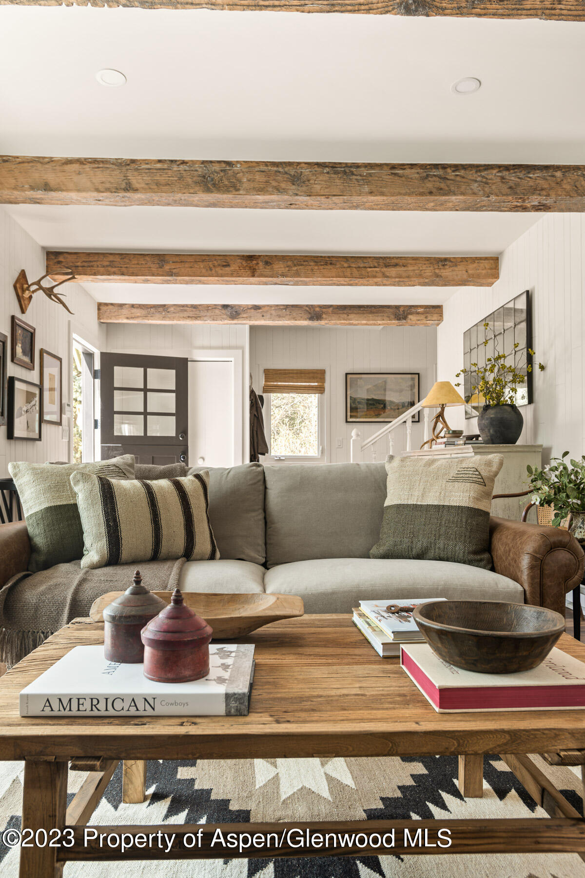 1470 Snowmass Creek Road Snowmass, CO 81654 - Photo 3 of 63 a living room with furniture and a rug