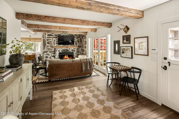 a view of a hallway with a washer and dryer