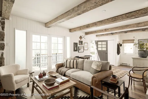 a room with fireplace and cabinets