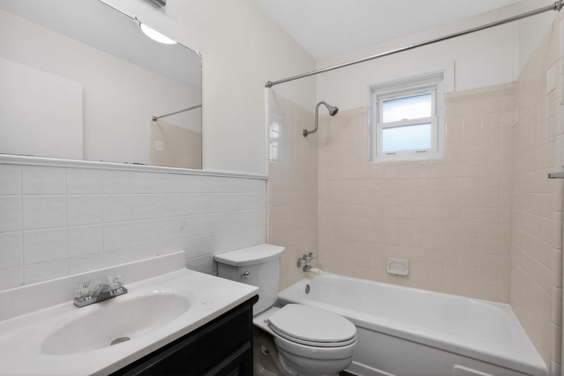 105 Shannon Lane Georgetown, TX 78628 - Photo 12 of 15 a bathroom with a sink toilet and shower