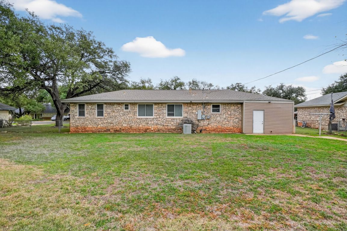 105 Shannon Lane Georgetown, TX 78628 - Photo 15 of 15 a view of a house with a backyard