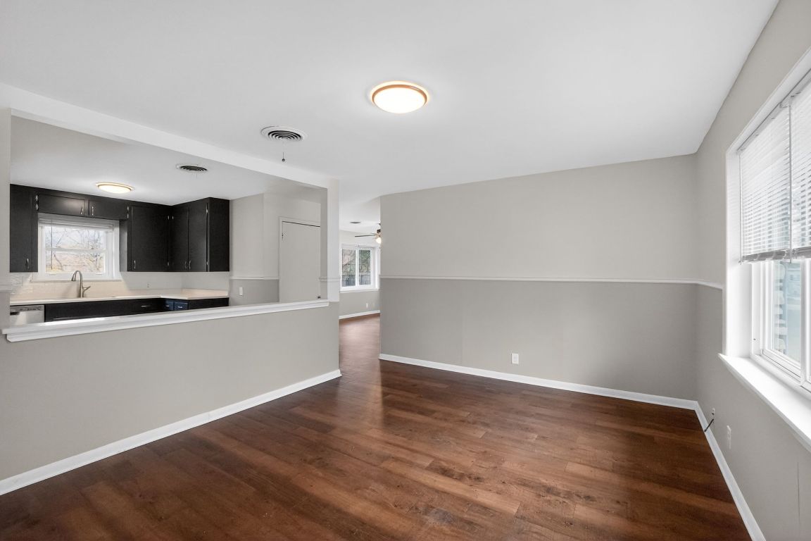 105 Shannon Lane Georgetown, TX 78628 - Photo 5 of 15 a view of a kitchen with wooden floor and a window