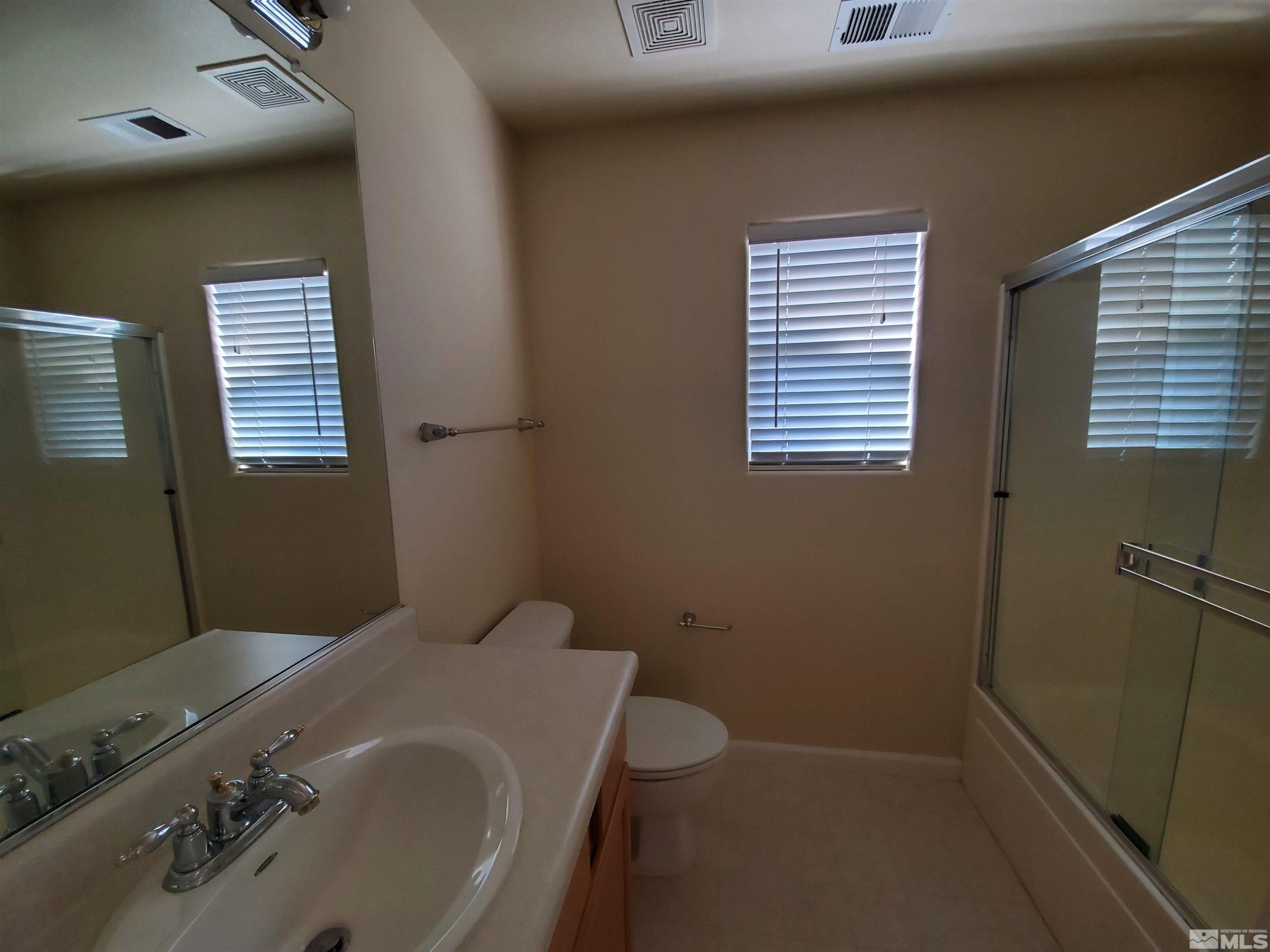2306 Clementine Lane Reno, NV 89521 - Photo 8 of 16 a bathroom with a sink and a tub