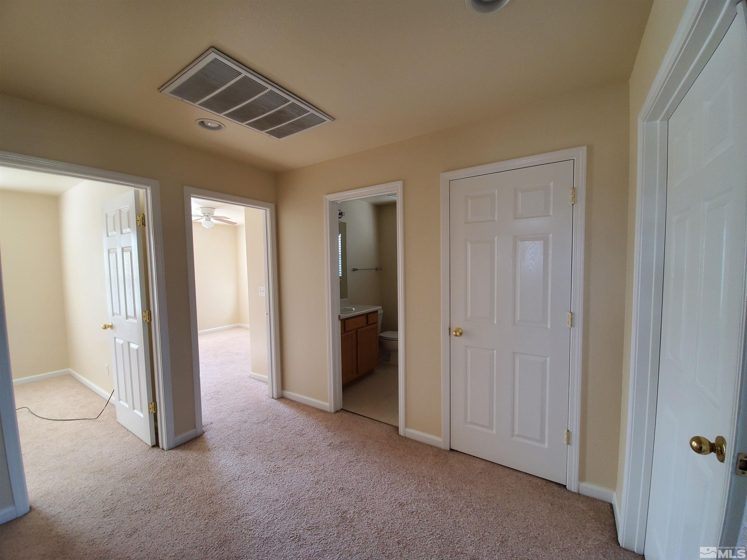 2306 Clementine Lane Reno, NV 89521 - Photo 9 of 16 an empty room with closet and a bathroom